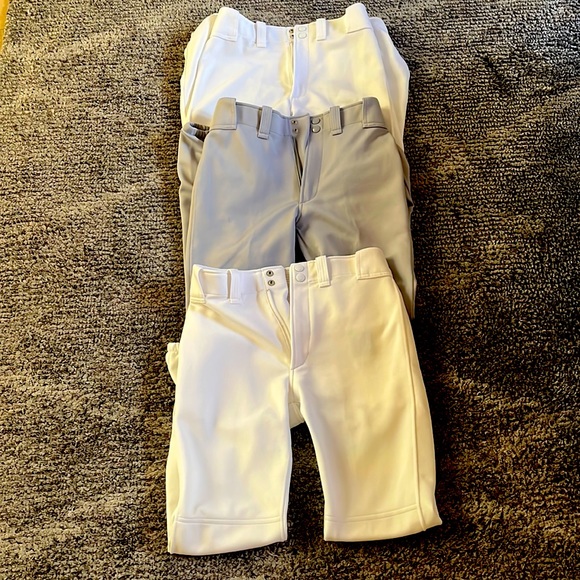 3 mizuno baseball pants. 2 white, 1 grey. Hardly worn.